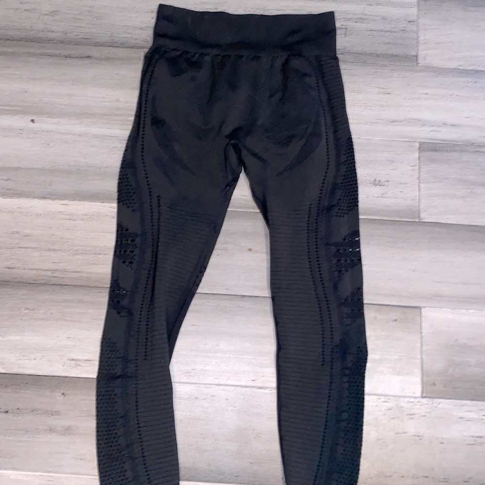 Seamless Black Gymshark leggings (hole designs) , Medium women’s sportswear